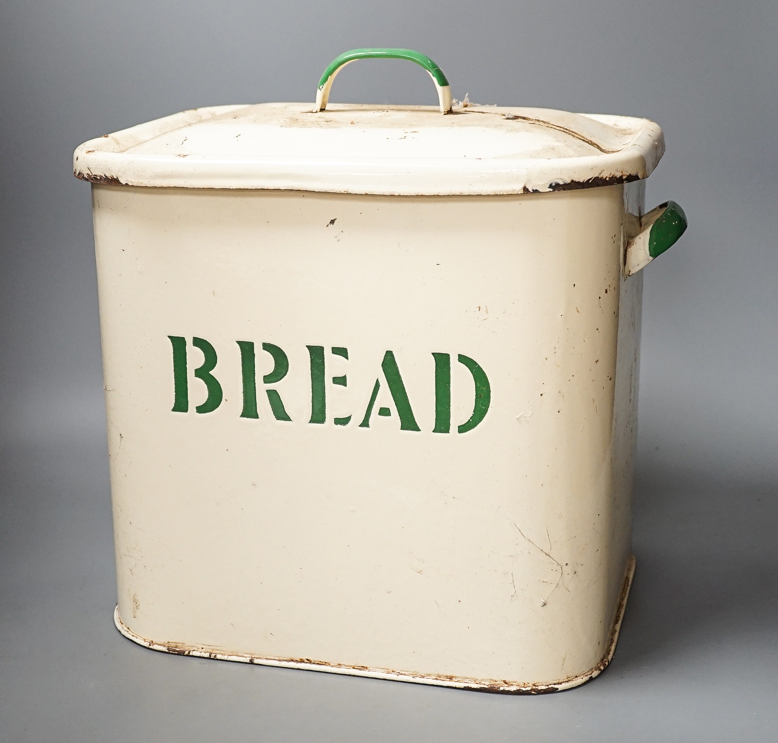 An enamelled lidded bread box